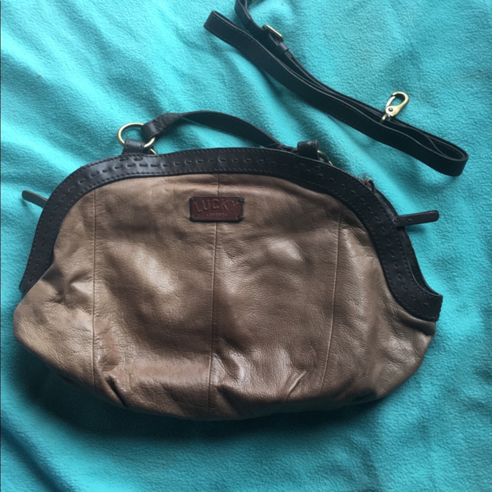 Lucky brand leather purse. With strap